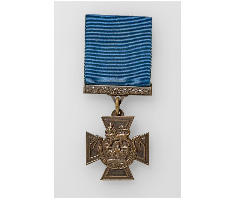 The blue ribbon Victoria Cross was awarded up to 1917.  It is the on Colour Sergeant John Prettyjohns would have received.